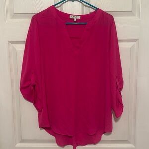 Neon pink blouse